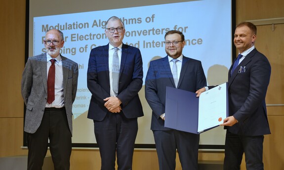 Od lewej: prof. Dave Thomas, prof. Franka Leferink, Hermes Jose Loschi i prof. Robert Smoleński; fot. K. Adamczewski